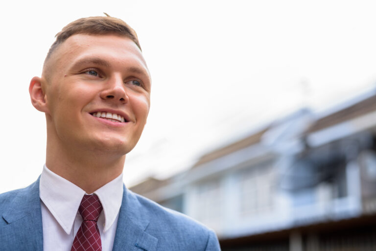 Portrait of young businessman in the streets outdoors